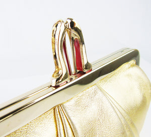 CHRISTIAN LOUBOUTIN Gold Mini Clutch bag with crossbody chain T