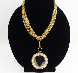 Chanel Magnifying Glass Necklace in Gold Plated Metal For Sale at 1stDibs