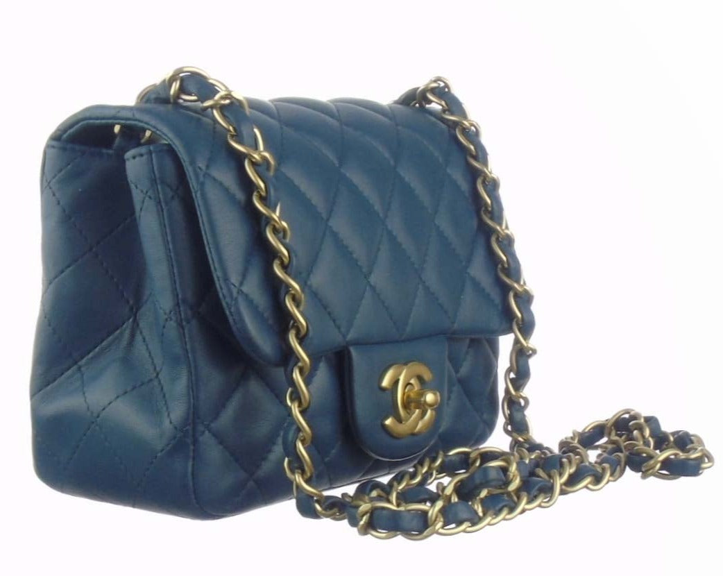 navy blue chanel bag with gold chain