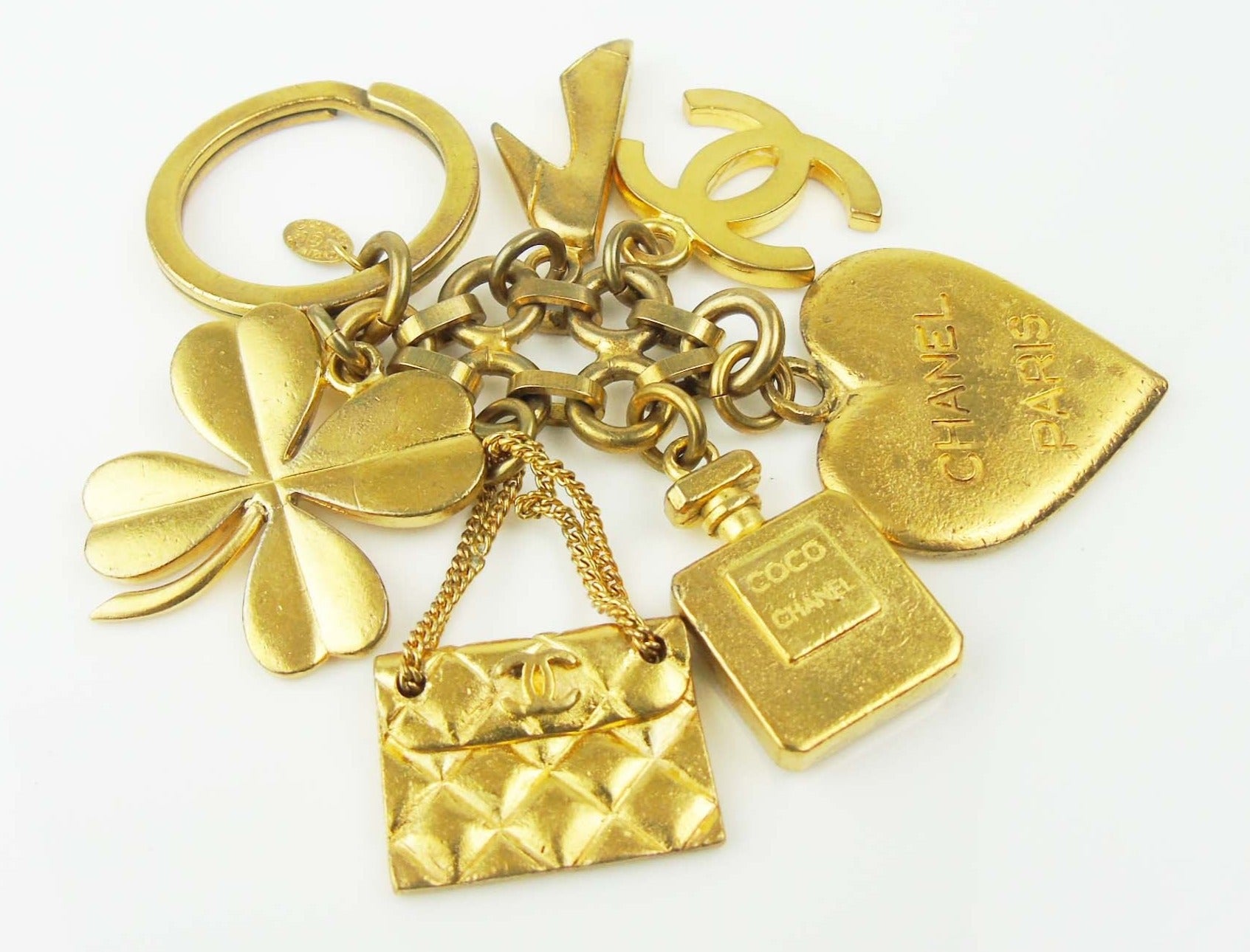 CHANEL Gold plated bag charms keyring - vintage – Loubi, Lou & Coco