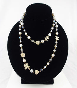 CHANEL Long Pearl Sautoir Necklace with CC logos hearts and charms