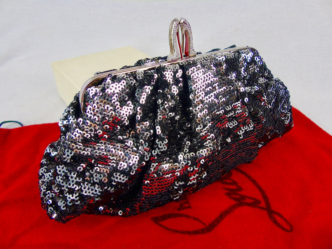 CHRISTIAN LOUBOUTIN sequin clutch black silver strassed shoe clasp