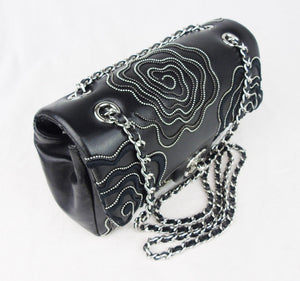 CHANEL 'Follies' black flap bag